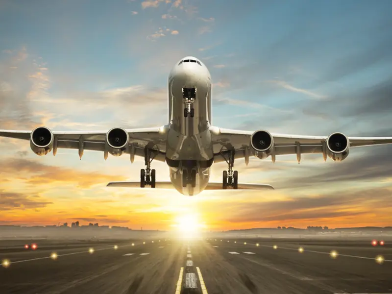 Long shot of a plane taking off.